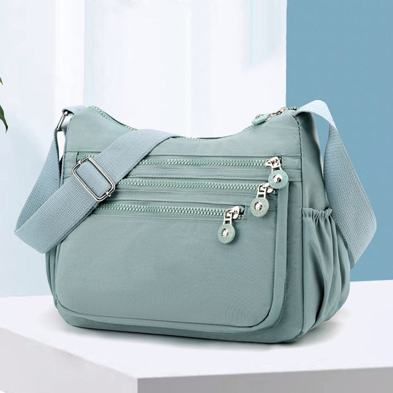 🎒 LIMITED-TIME 50% OFF! ✨ Lightweight Nylon Crossbody Bag – Multi-Pocket, Water-Resistant, Adjustable 🔧