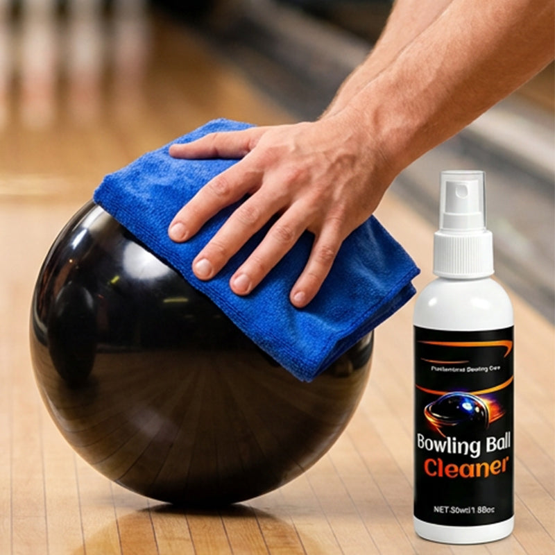 Bowling ball cleaner bottle and towel close-up
